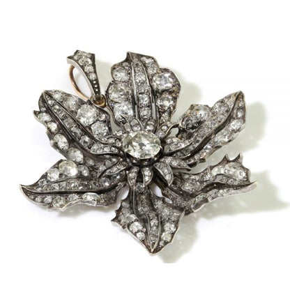 Antique Victorian Old Cut Diamond Flower Pendant, 9 carat total, in silver and 15ct gold, Circa 1840s