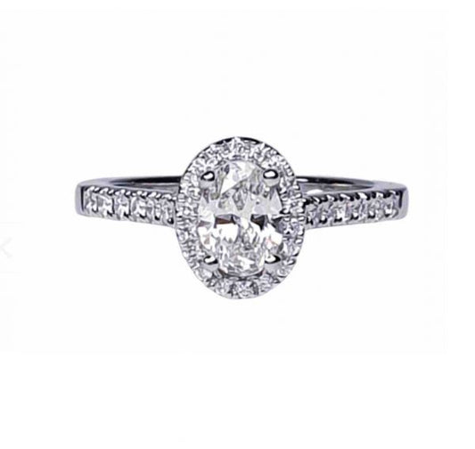 Diamond Oval Cluster Engagement Ring; GIA certified 0.50 carat F colour SI1 clarity oval faceted with diamond surround and diamond-set shoulders, in Platinum