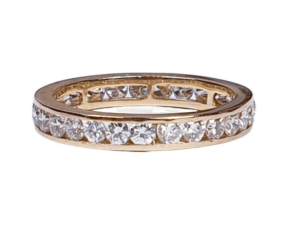 Vintage Diamond Full Eternity Band Ring; channel set with round brilliant-cut diamonds, 1.00 carat total, in 18ct yellow gold, Circa 1970s