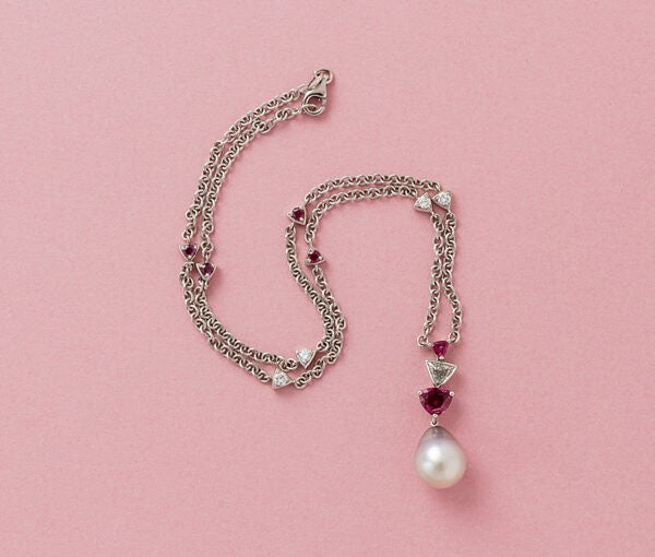 Light Grey Tahiti Pearl, Trilliant Ruby and Trilliant Diamond Pendant on a Ruby and Diamond decorated 18ct White Gold Chain