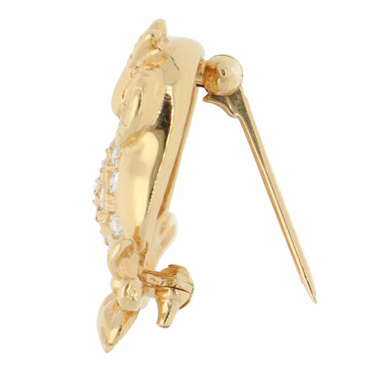 Diamond owl brooch in yellow gold.