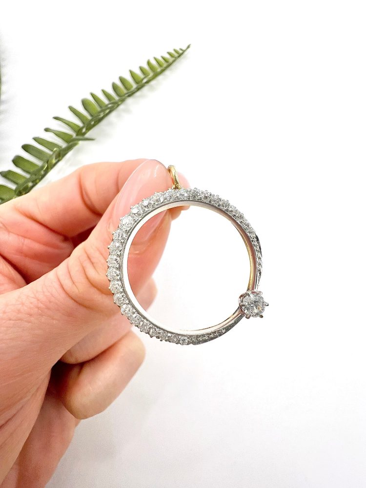 Edwardian diamond crescent moon pendant in white gold.