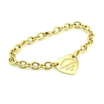 Tiffany and Co 18ct Yellow Gold Bracelet; with Please return to Tiffany & Co New York heart charm, Circa 2013, original Tiffany & Co box