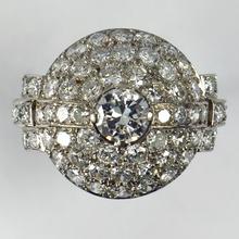 Art Deco French 3.60ct Diamond and Platinum Target Dome Bombe Ring; central 0.50ct round brilliant cut diamond surrounded with 48 brilliant diamonds and diamond set shoulders, 3.60 carat total