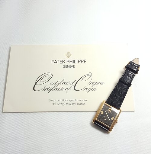 Patek Philippe 5014J Gondolo 18ct Yellow Gold 28mm Manual, black dial, Arabic numerals, small seconds sub-dial at 6, sapphire crystal, leather strap with 18ct yellow gold buckle, Circa 2003, with Original Papers