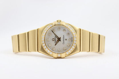 Omega Constellation Double Eagle 18ct Yellow Gold Ladies 25mm Quartz Watch, 11897500, diamond bezel and hour markers, mother of pearl dial, 18ct Gold bracelet strap with a double-fold hidden clasp, original Omega box and papers.