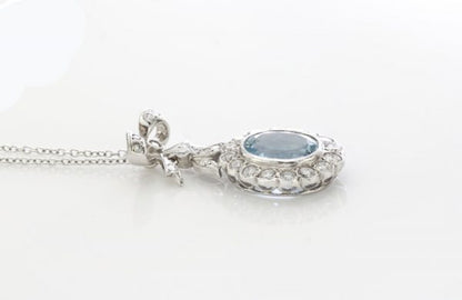 1.50ct Aquamarine and Diamond Oval Cluster Pendant, in 18ct white gold