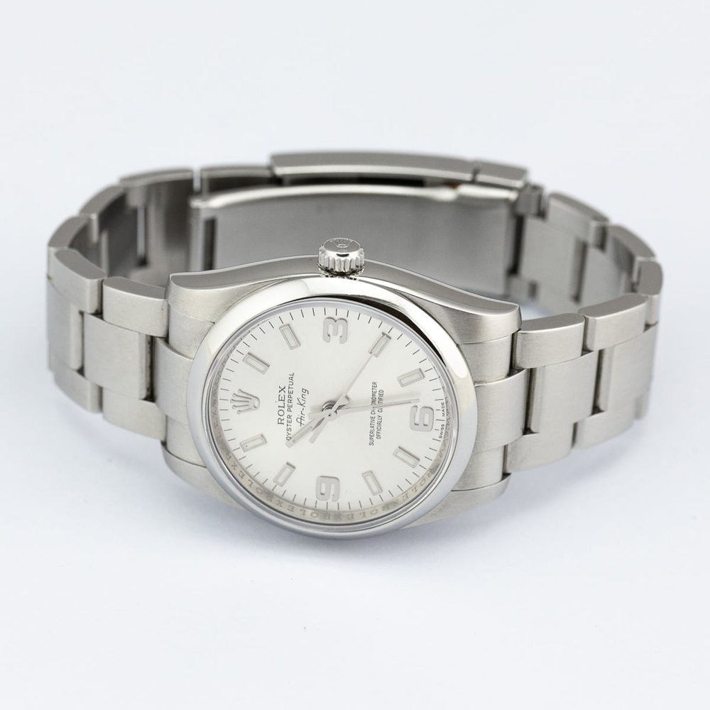 Rolex Air King 114200 34mm Stainless Steel Automatic Watch, silver dial and smooth polished bezel on steel bracelet strap