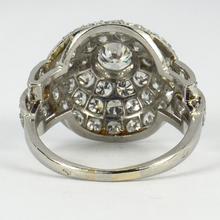 Art Deco French 3.60ct Diamond and Platinum Target Dome Bombe Ring; central 0.50ct round brilliant cut diamond surrounded with 48 brilliant diamonds and diamond set shoulders, 3.60 carat total