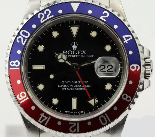 Rolex GMT Master 16700 Stainless Steel 40mm Automatic Watch, black dial, Pepsi red and blue rotating bezel, 24 hour hand, date indicator and sapphire crystal. Stainless steel Oyster bracelet. With Rolex box and papers. Purchased in 1996.
