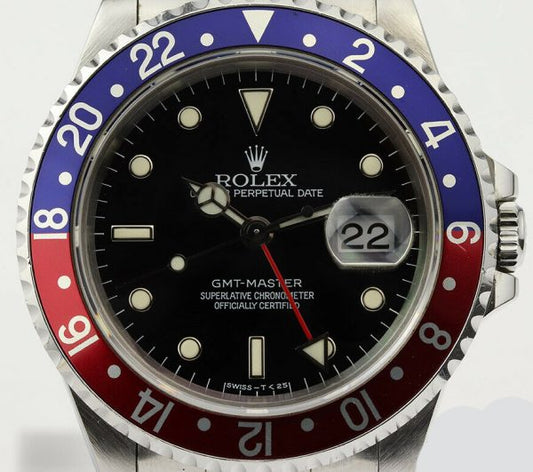 Rolex GMT Master 16700 Stainless Steel 40mm Automatic Watch, black dial, Pepsi red and blue rotating bezel, 24 hour hand, date indicator and sapphire crystal. Stainless steel Oyster bracelet. With Rolex box and papers. Purchased in 1996.