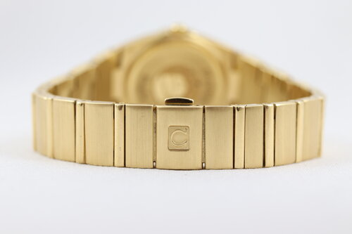 Omega Constellation Double Eagle 18ct Yellow Gold Ladies 25mm Quartz Watch, 11897500, diamond bezel and hour markers, mother of pearl dial, 18ct Gold bracelet strap with a double-fold hidden clasp, original Omega box and papers.