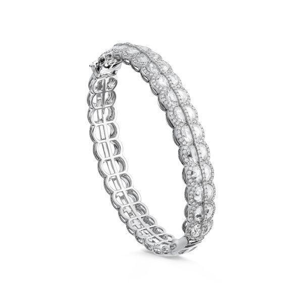 Rare Moon Shaped Rose Cut Diamond Bangle Bracelet; featuring 30 extremely rare moon shaped rose cut diamonds totalling 4.83 carats, complemented by 276 round brilliant-cut diamonds