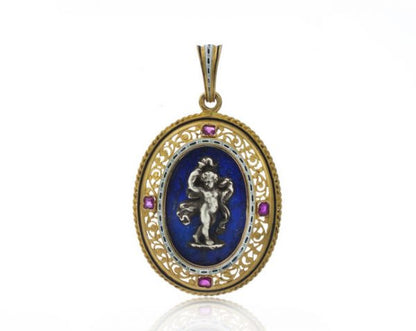 Antique Italian 18ct Yellow Gold Pendant in the style of Castellani; featuring a silver cherub on lapis lazuli, in 18ct pierced surround accented with rubies, Circa 1850-1870s