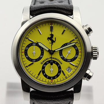 Girard Perregaux Ferrari 8020 Automatic Chronograph Watch; 38mm stainless steel case with yellow dial, baton hour markers, date indicator between the 4 and 5 hour marks, chronograph function with 3 registers and sapphire crystal, on an unbranded black leather strap with GP Ferrari pin buckle