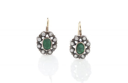 Antique Victorian Emerald and Diamond Oval Cluster Drop Earrings; 2.00cts emeralds surrounded by 0.80cts diamonds, in silver and gold. Circa 1870s