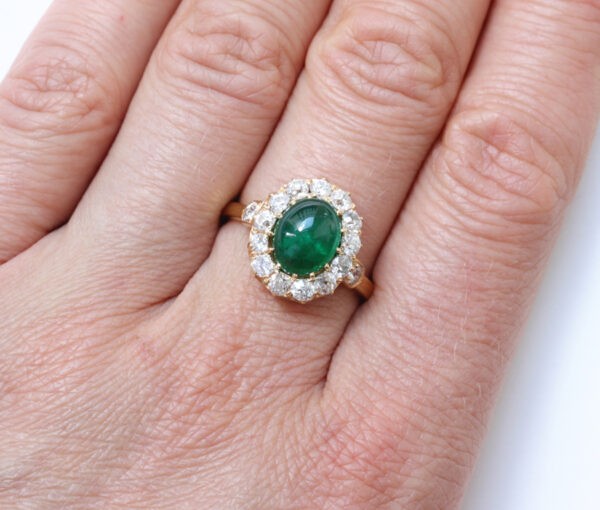 Antique Edwardian 2.70ct Oval Cabochon Emerald and 1.65ct Old Cut Diamond Cluster Ring, in 18ct yellow gold