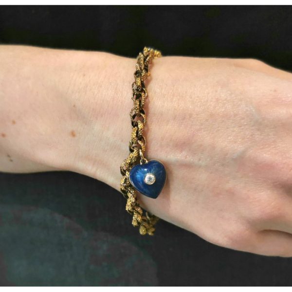 Antique Victorian Gold Heart Charm Bracelet; Prince of Wales chain bracelet with granulated links, set with natural pearl and old-cut diamond cluster clasp, suspending a modern blue guilloche enamel heart charm set with a central old-cut diamond