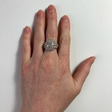 Art Deco French 3.60ct Diamond and Platinum Target Dome Bombe Ring; central 0.50ct round brilliant cut diamond surrounded with 48 brilliant diamonds and diamond set shoulders, 3.60 carat total