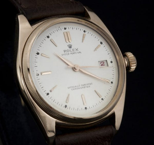 Rolex Oyster Perpetual 4467 18ct Rose Gold Bubble Back Automatic Chronometer; 36mm, white dial, with box and papers, Circa 1947