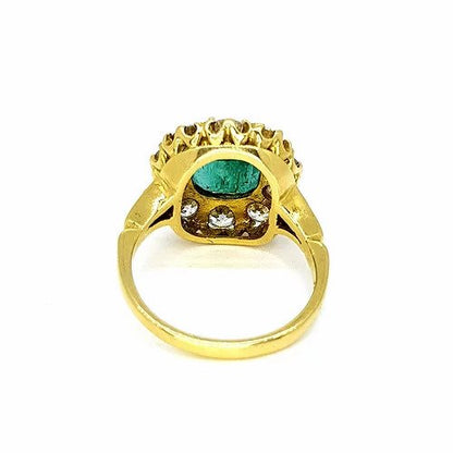 Emerald and Diamond Cluster Ring; central 3.65 carat cushion-cut emerald surrounded by 1.75cts sparkling diamonds, in 18ct yellow gold