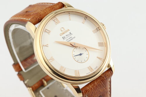 Omega De Ville Prestige 18ct Rose Gold 39mm Automatic Chronometer, Ref 4614.30.02, silver dial, Roman numerals, small seconds, sapphire crystal, on a brown leather strap with 18ct Omega pin buckle, with Omega papers and tag