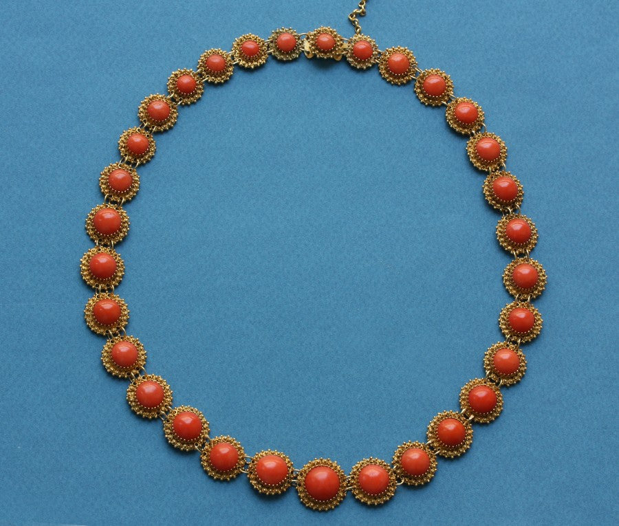 Antique Victorian Coral Riviere Necklace; featuring thirty-one graduated cabochon corals decorated within 14ct yellow gold granulations. Netherlands, 19th century