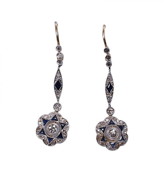 Antique Edwardian Sapphire and Diamond Star Cluster Drop Earrings; featuring sapphires and diamonds arranged in a star cluster pattern suspended from diamond and sapphire set drops, in platinum and 18ct gold