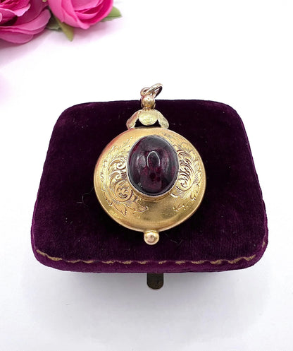 Victorian 15 Carat Two-Colour Gold Cabochon Garnet Locket Back Pendant, Circa 1870