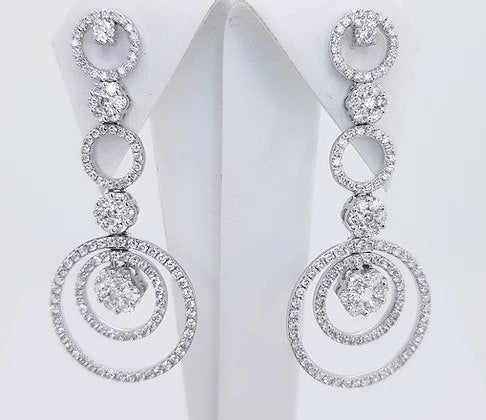 Contemporary 3ct Diamond Circular Drop Earrings, comprising of diamond set circles and clusters, 3.00 carat total, in 18ct white gold.