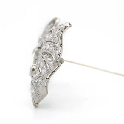 Vintage 8ct Old Cut Diamond Bow Brooch, set with 8 carats of old-cut, single-cut and square shaped diamonds in 18ct white gold with a 14ct white gold pin