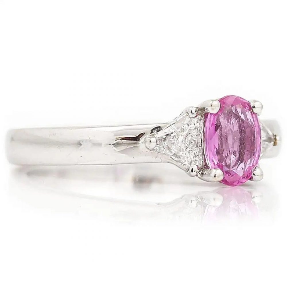 0.84ct Pink Sapphire and Trilliant Diamond Three Stone Ring