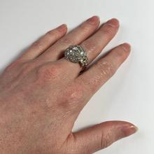 Art Deco French 3.60ct Diamond and Platinum Target Dome Bombe Ring; central 0.50ct round brilliant cut diamond surrounded with 48 brilliant diamonds and diamond set shoulders, 3.60 carat total