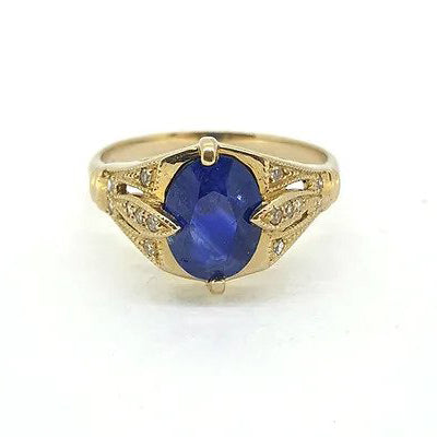 Decorative Sapphire Ring with Diamond Split Shoulders