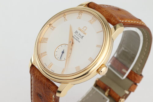 Omega De Ville Prestige 18ct Rose Gold 39mm Automatic Chronometer, Ref 4614.30.02, silver dial, Roman numerals, small seconds, sapphire crystal, on a brown leather strap with 18ct Omega pin buckle, with Omega papers and tag