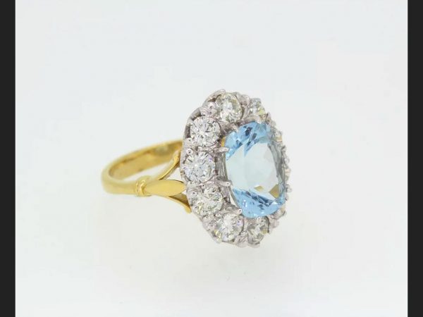 Aquamarine and Diamond Cluster Ring, 5.80 carat total, Yellow Gold