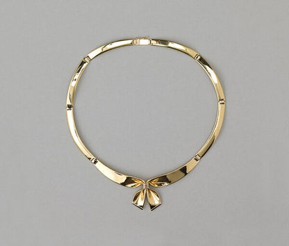 Vintage French 18ct Gold Bow Collar Necklace; half-rounded yellow gold links alternated with small white gold links, central yellow gold ribbon held by three white gold bands like a bow