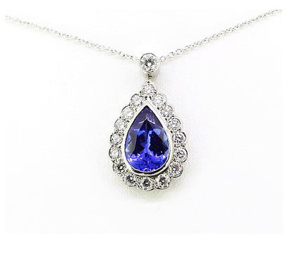 Tanzanite and Diamond Pear-Shaped Cluster Pendant; central 3.50ct pear-cut tanzanite surrounded by 1.00ct diamonds, with diamond set bale, 18ct white gold