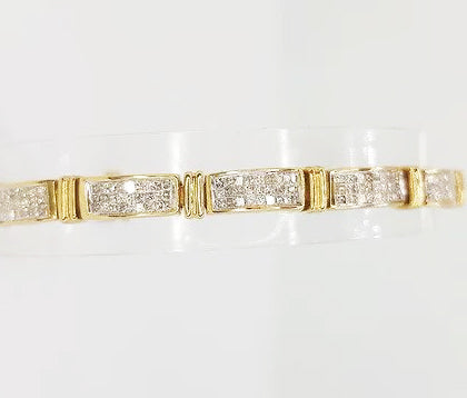6.00ct Diamond and 18ct Yellow Gold Panel Line Bracelet; An elegant diamond bracelet comprising of diamond set panels, 18ct gold. Diamond total 6 carats