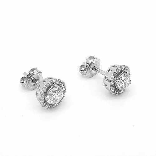 Contemporary Diamond Cluster Halo Stud Earrings; central round brilliant-cut diamond, four-claw set and surrounded by a fixed halo, 1.19 carat total, in 18ct white gold