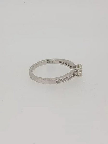 0.53ct Diamond Solitaire Engagement Ring with Princess Cut Diamond Shoulders in 18ct white gold
