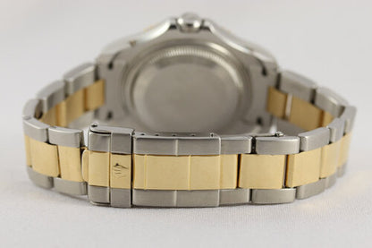 Rolex Yacht Master Midsize 35mm Steel and Gold Automatic, silver dial, gold bezel, date indicator, luminescent hands and hour markers, screw-down crown, sapphire crystal, steel and gold Oyster bracelet strap with steel and gold fold-over clasp