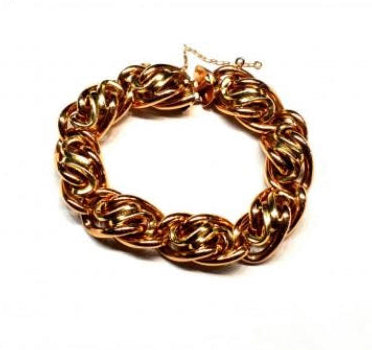 Vintage Bi Colour 18ct Gold Link Bracelet; comprised of intertwined 18ct rose and yellow gold links. Made in Argentina, Circa 1960