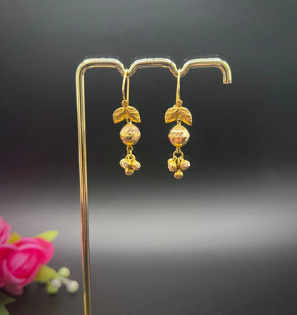 A pair of yellow gold leaf and faceted ball drop earrings with hook fittings