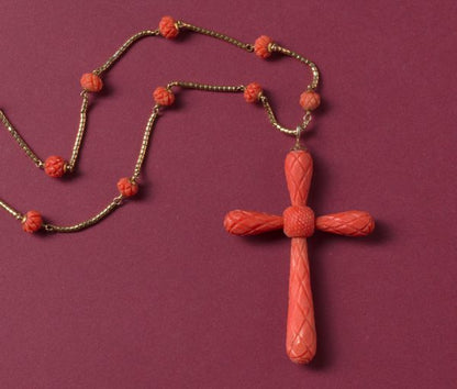 Antique Georgian Carved Coral Cross and Chain Necklace; with geometrical kite shaped and pine shaped decorations, on gold chain with carved coral beads