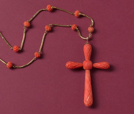 Antique Georgian Carved Coral Cross and Chain Necklace; with geometrical kite shaped and pine shaped decorations, on gold chain with carved coral beads