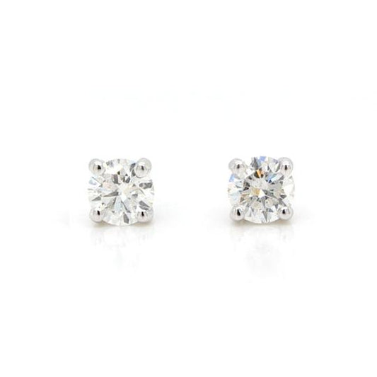 Pair of Diamond Single-Stone Solitaire Stud Earrings; featuring two round brilliant-cut diamonds totaling 0.82 carats, four-claw set, in 18ct white gold.