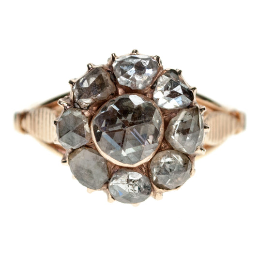 A rose-cut diamond cluster ring in yellow gold