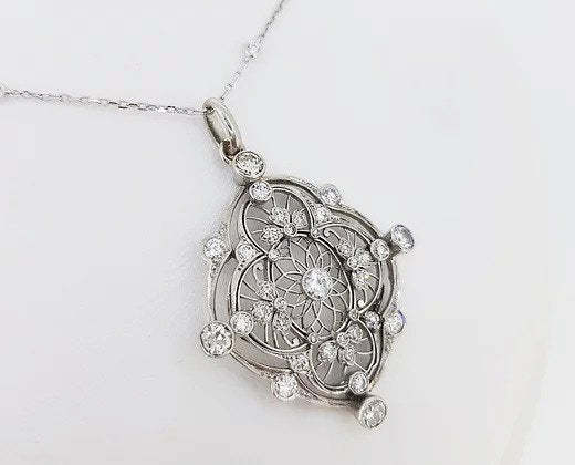 Antique Old Cut Diamond set Pendant; openwork pendant set with old cut diamonds, 18ct white gold.