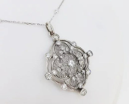 Antique Old Cut Diamond set Pendant; openwork pendant set with old cut diamonds, 18ct white gold.
